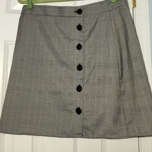 Black and white plaid button front mini skirt